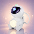 Astro Galaxy Projector: white seated astronaut holding a glowing moon